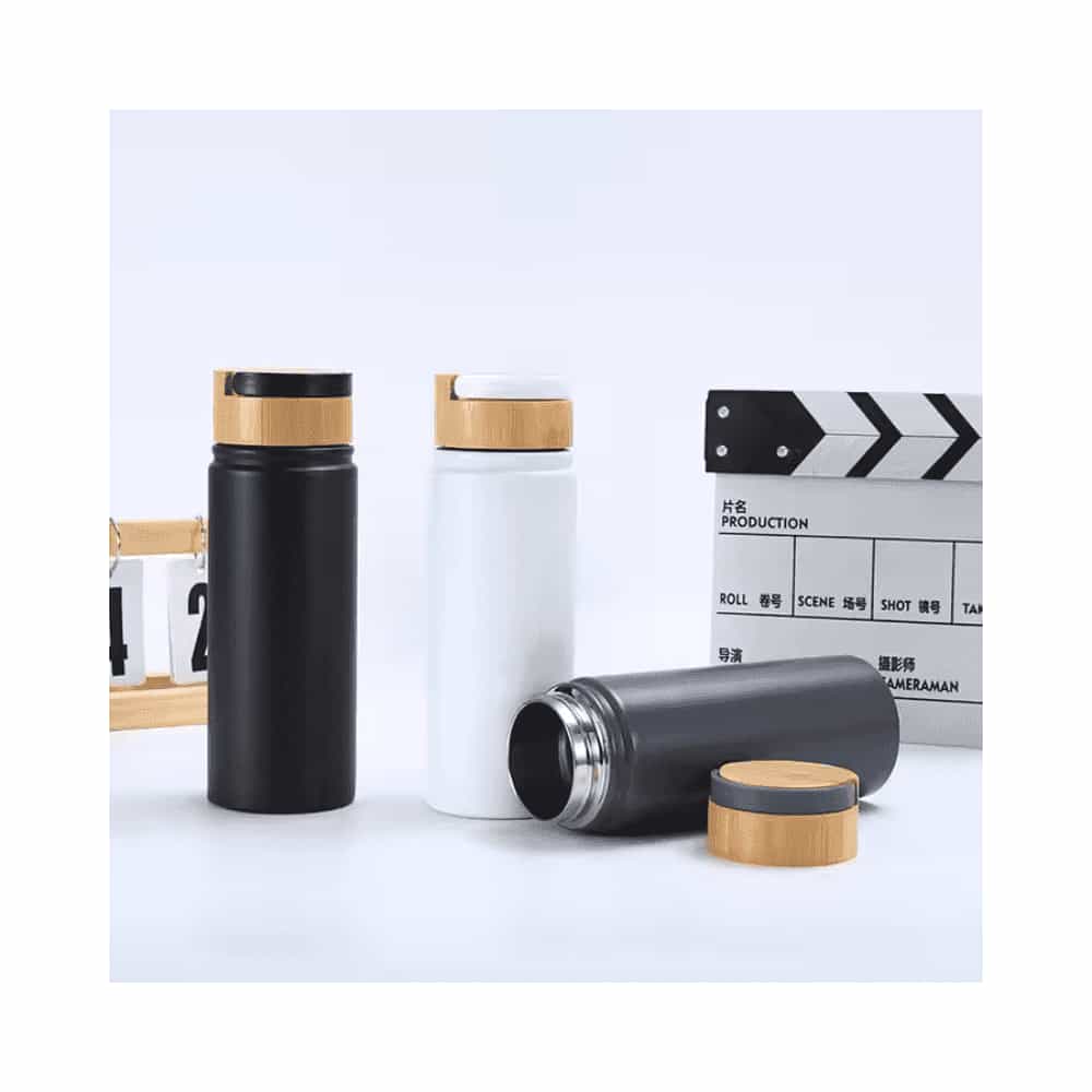 Vacuum insulated water bottle with bamboo lid and handle – sustainable corporate gift in Dubai